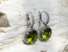 SJ1998 - Peridot with Diamond Earrings Set in 18 Karat White Gold Settings