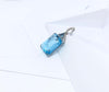 SJ2825 - Blue Topaz and Diamond Pendant Set in 18 Karat White Gold Settings