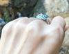 SJ1167 - Blue Sapphire with Emerald and Diamond Ring Set in 18 Karat White Gold Settings