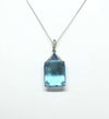 SJ2825 - Blue Topaz and Diamond Pendant Set in 18 Karat White Gold Settings