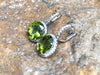SJ1998 - Peridot with Diamond Earrings Set in 18 Karat White Gold Settings