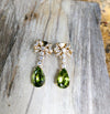 SJ6179 - Peridot with Diamond Bow Earrings Set in 18 Karat Gold Settings