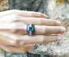 SJ1230 - Emerald with Blue Sapphire with Diamond Ring Set in 18 Karat Gold Settings