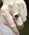 SJ1986 - Round Cut Blue Sapphire with Diamond Ring Set in 18 Karat Gold Settings