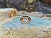 SJ1974 - White Sapphire Ring Set in 18 Karat Rose Gold Settings