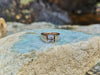 SJ1974 - White Sapphire Ring Set in 18 Karat Rose Gold Settings