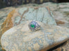 SJ1446 - Emerald with Blue Sapphire and Diamond Ring Set in 18 Karat White Gold Settings