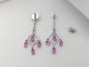 SJ1146 - Pink Sapphire with Diamond Earrings Set in 18 Karat White Gold Settings
