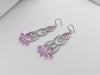 SJ1235 - Pink Sapphire with Diamond Earrings Set in 18 Karat White Gold Settings