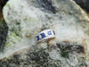 SJ2585 - Blue Sapphire with Diamond Ring Set in 18 Karat White Gold Settings