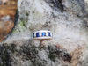 SJ2585 - Blue Sapphire with Diamond Ring Set in 18 Karat White Gold Settings