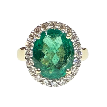 JR0310K - Emerald and Diamond Halo Ring Set in 18K Gold Setting