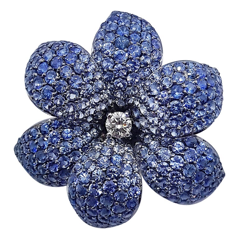 SJ2415 - Blue Sapphire with Diamond Flower Pendant Set in 18 Karat White Settings