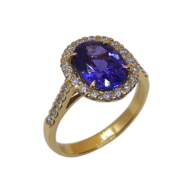 SJ2316 - Tanzanite with Diamond Ring Set in 18 Karat Rose Gold Settings