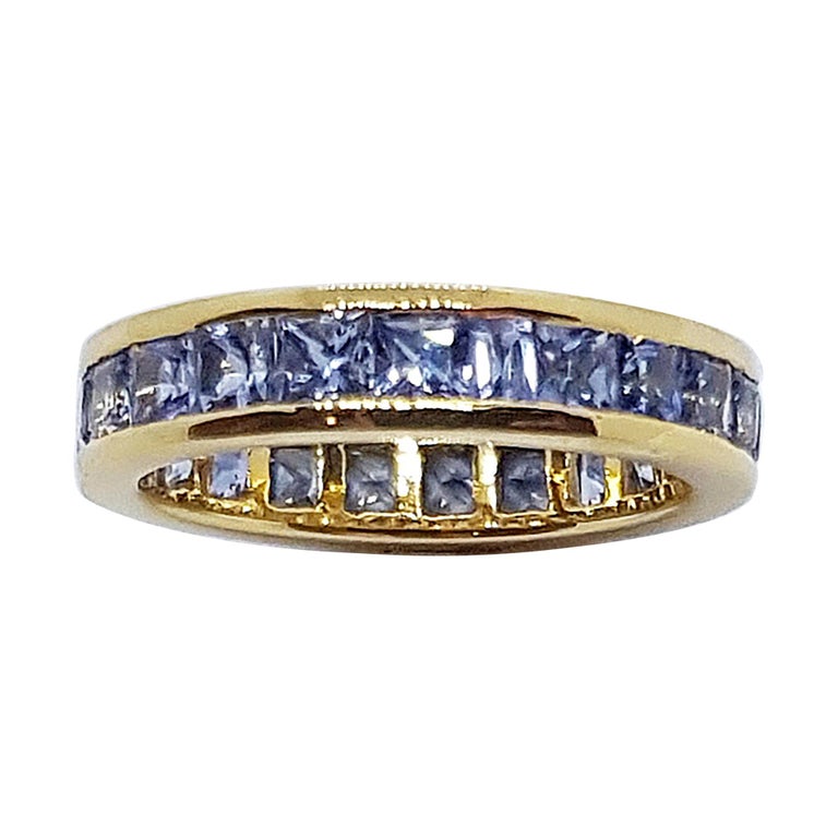 SJ2431 - Pastel Blue Sapphire Eternity Ring Set in 18 Karat Gold Settings