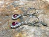 SJ6193 - Ruby with Diamond Earrings Set in 18 Karat White Gold Settings