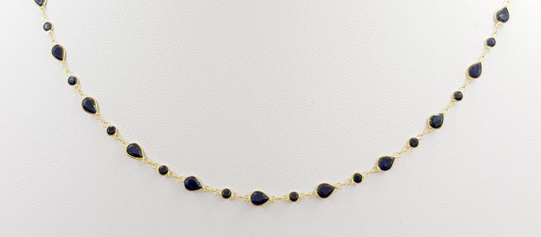 SJ1312 - Blue Sapphire Necklace Set in 18 Karat Gold Settings