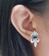 SJ1766 - Blue Sapphire with Diamond Fleur-de-lis Earrings Set in 18 Karat White Gold