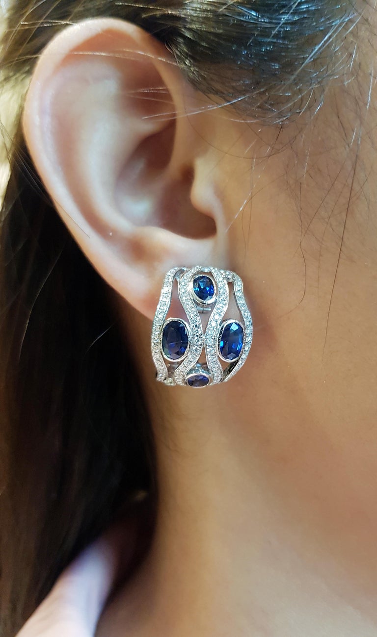 SJ1506 - Blue Sapphire with Diamond Earrings Set in 18 Karat White Gold Settings