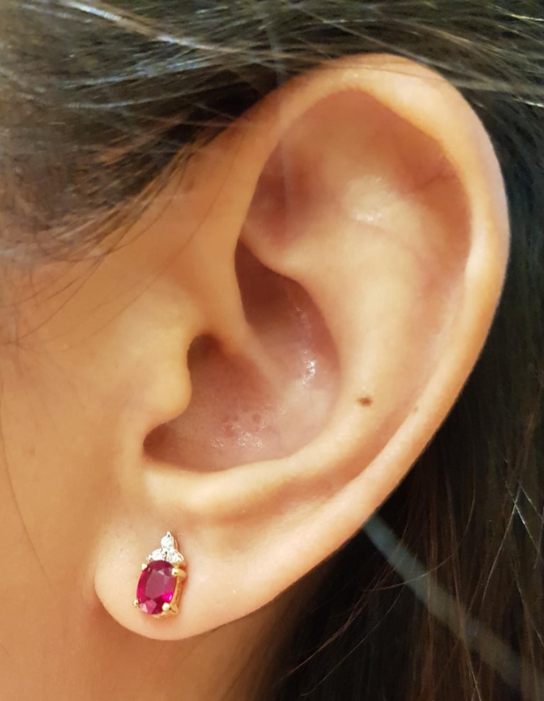 JE0367T - Ruby & Diamond Earrings Set in 18 Karat Gold Setting