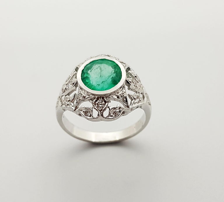 JR0233P - Emerald & Diamond Ring Set in 18 Karat White Gold Setting