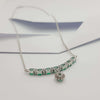 SJ2919 - Emerald with Diamond Necklace Set in 18 Karat Gold Settings
