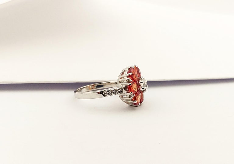 SRTE5546 - Orange Sapphire & Cubic Zirconia Ring set in Silver Settings