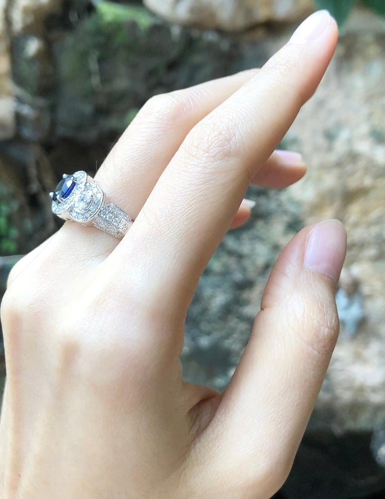 SJ1212 - Blue Sapphire with Diamond Ring Set in 18 Karat White Gold Settings