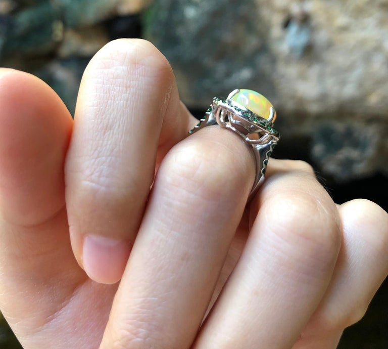 SJ1352 - Opal 3.84 Carats with Tsavorite 0.96 Carat Ring Set in 18 Karat White Gold Setti