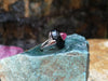 SJ6297 - Cabochon Ruby with Onyx Ring Set in 18 Karat White Gold Settings