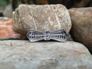 JP11911Z - Blue Sapphire with Diamond Bow Brooch Set in 18K  White Setting