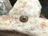 SJ2173 - Ruby with Cabochon Blue Sapphire and Tsavorite Ring Set in 18 Karat Gold Setting
