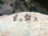 SJ2300 - Ruby with Diamond Flower Earrings Set in 18 Karat White Gold Settings