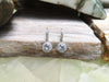 SJ2306 - White Sapphire with Diamond Earrings Set in 18 Karat White Gold Settings