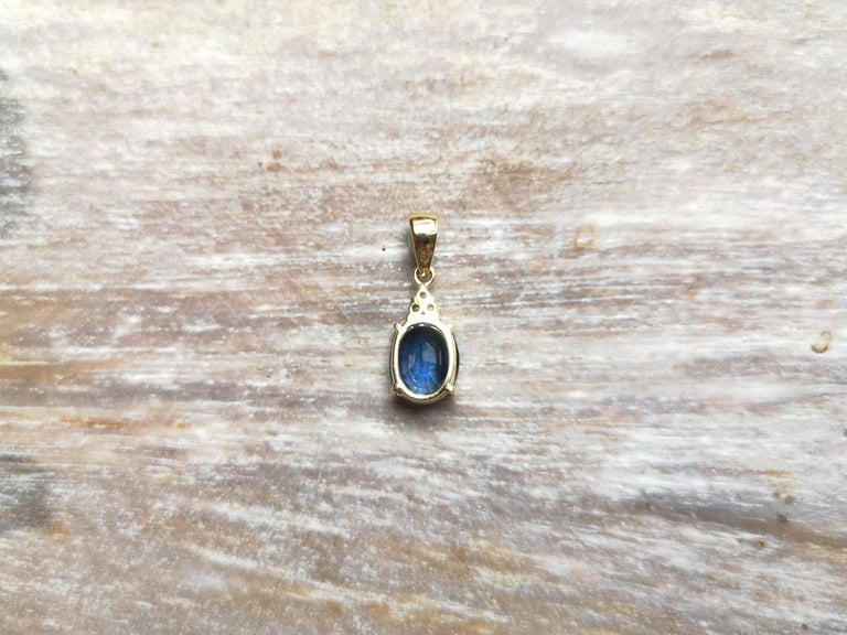 SJ2106 - Blue Sapphire with Diamond Pendant Set in 18 Karat Gold Settings