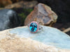SJ1449 - Blue Zircon with Pink Sapphire, White Sapphire Ring set in 18 Karat White Gold