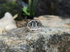 SJ1416 - Blue Star Sapphire Ring Set in 18 Karat White Gold Settings