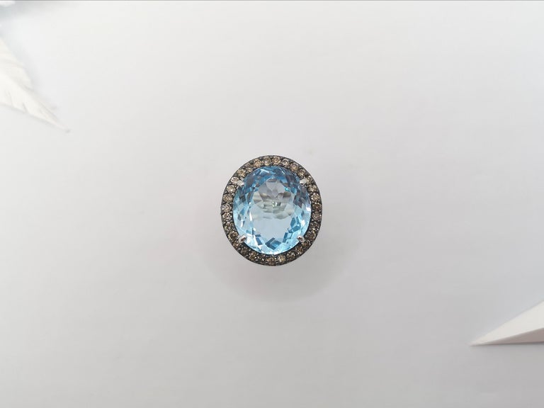 JR0637T - Blue Topaz & Brown Diamond Ring Set in 18 Karat White Gold Setting