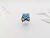 SJ1273 - Blue Topaz with Blue Sapphire and Diamond Ring in 18 Karat White Gold Settings