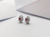 JE0137P - Ruby & Diamond Earrings Set in 14 Karat White Gold Setting