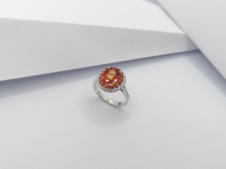 JR0420U - Orange Sapphire & Diamond Ring set in 18 Karat White Gold Settings