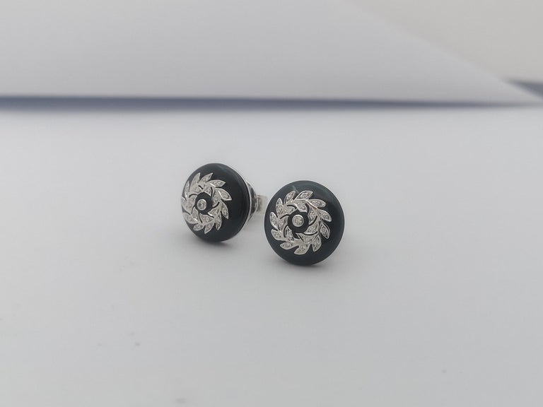 SJ1226 - Onyx with Diamond Earrings Set in 14 Karat White Gold Settings