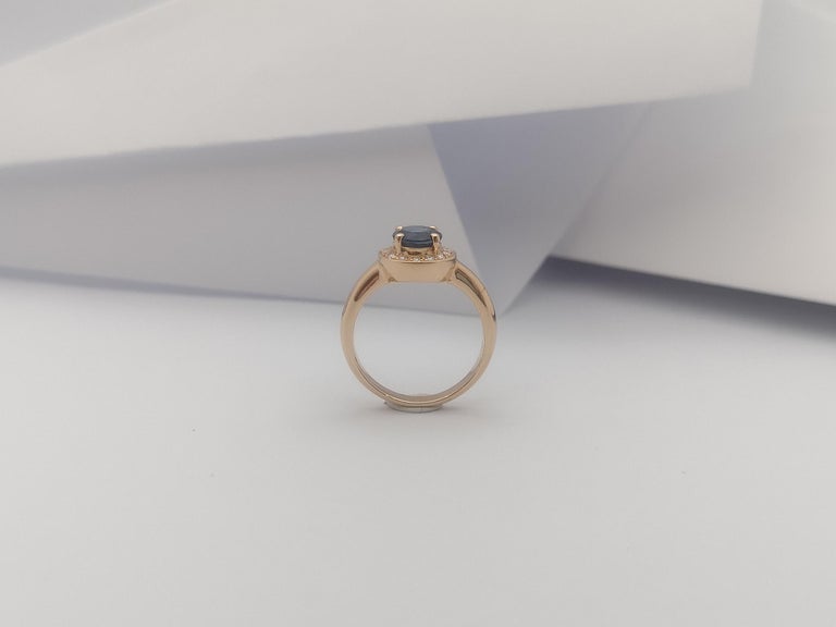 JR0290R - Blue Sapphire & Diamond Halo Ring Set in 18 Karat Rose Gold Setting