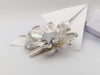 SJ2286 - Fresh Water Pearl with Diamond Flower Brooch Set in 18 Karat White Gold Settings