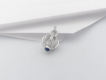SJ2945 - Cabochon Blue Sapphire with Diamond Dorje Pendant in 18 Karat White Gold