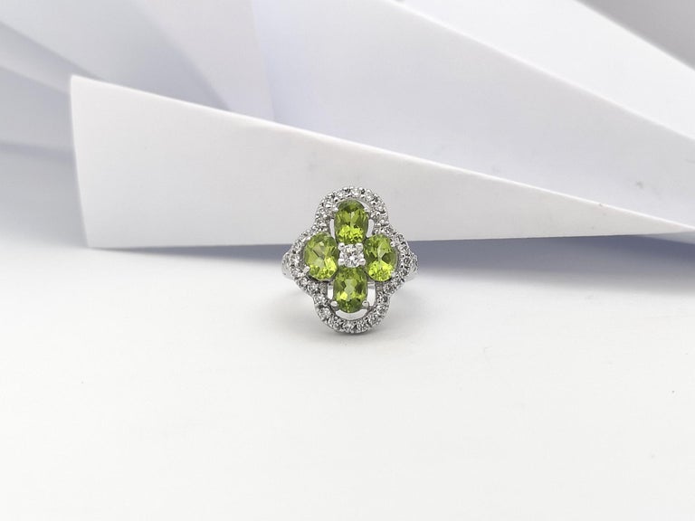 SJ2865 - Peridot with Cubic Zirconia Ring set in Silver Settings