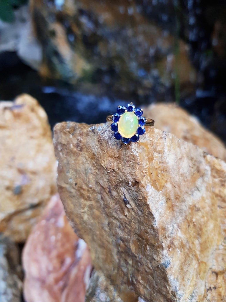 SJ3123 - Opal with Blue Sapphire Ring Set in 18 Karat Gold Settings