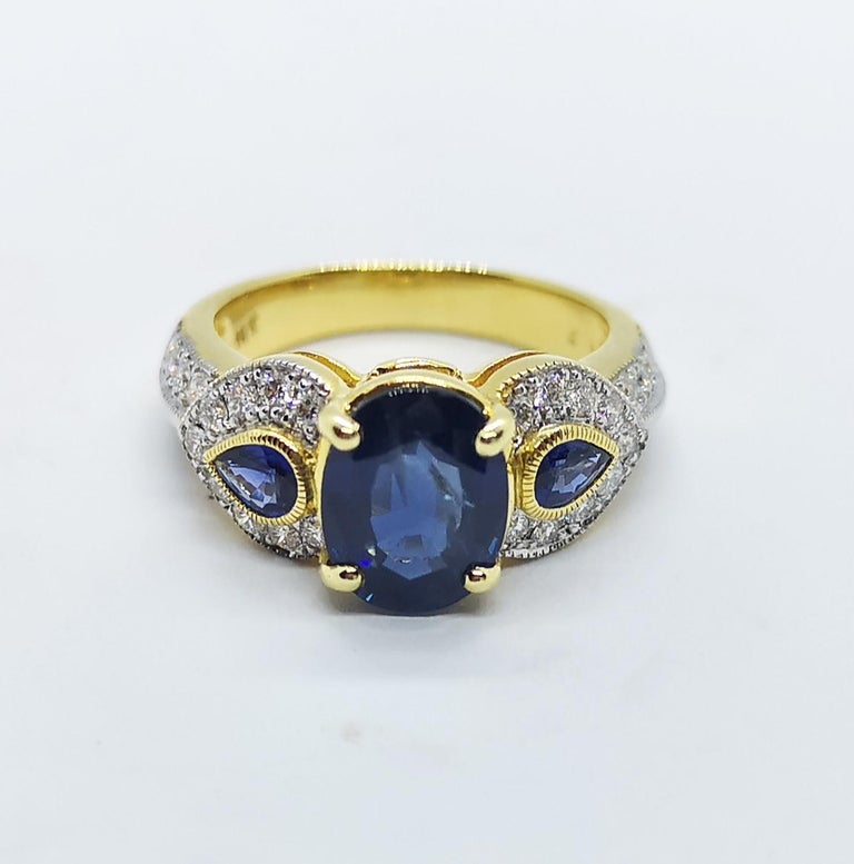 SJ2626 - Blue Sapphire with Diamond Ring Set in 18 Karat Gold Settings